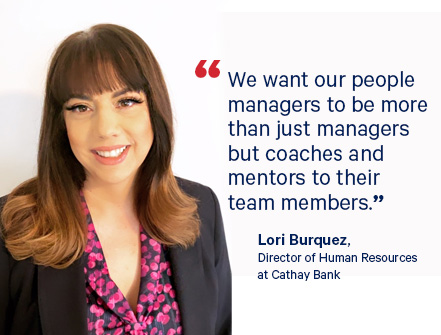 Lori Burquez, Director of Human Resources at Cathay Bank, poses for a professional headshot.